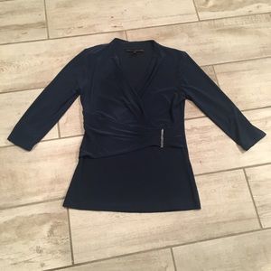 Blue top with side metal detail